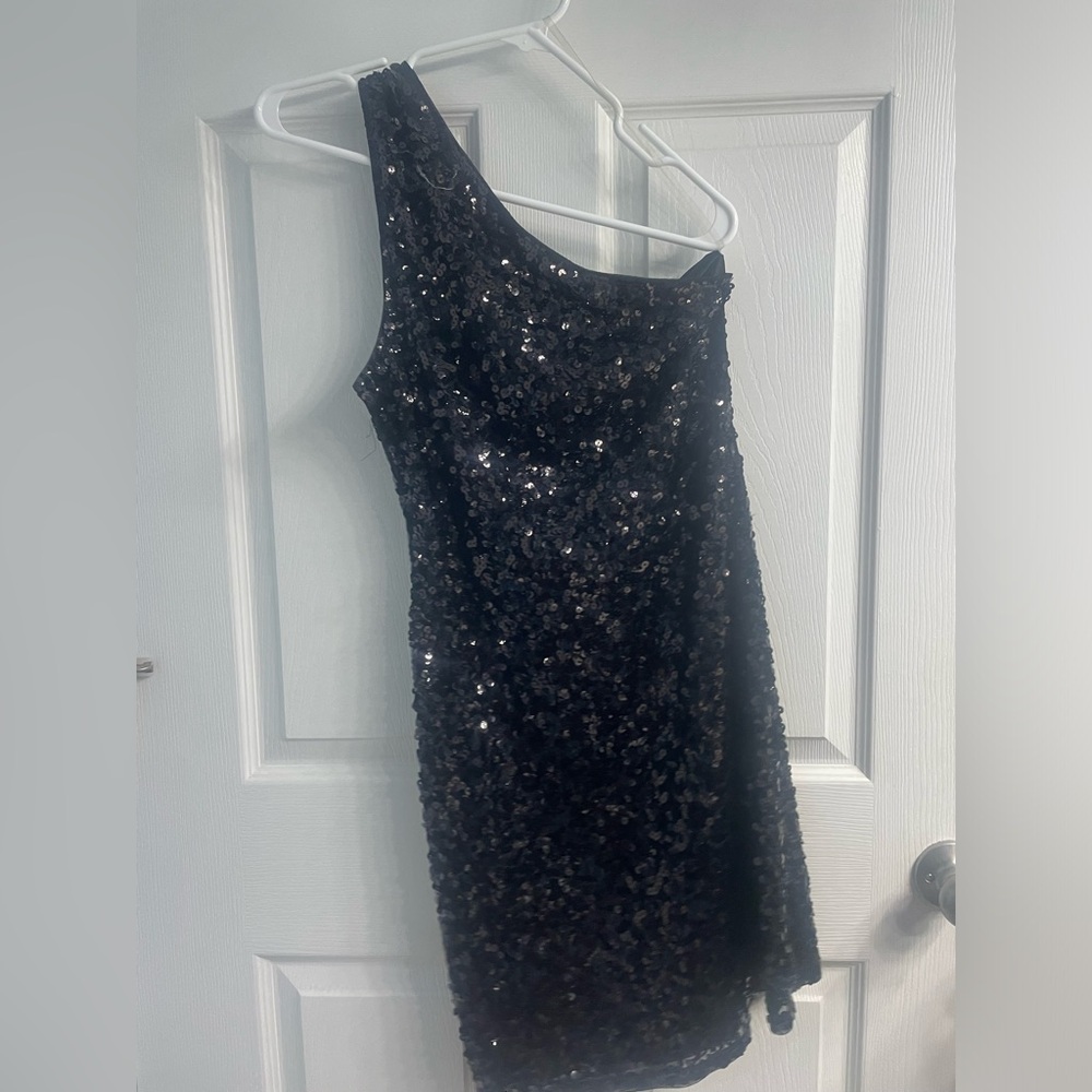 One should black sparkly dress